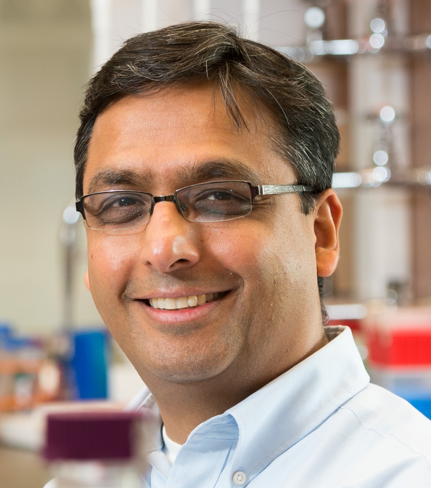 Dr. Amit Dhingra in a lab headshot