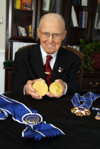 Dr. Borlaug with awards